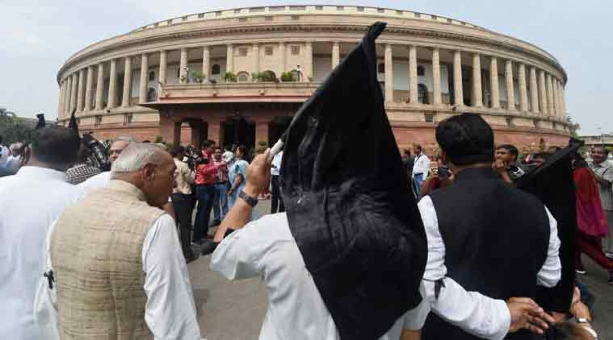 Cong MP squats in the well of Lok Sabha after he is refused chance to raise question